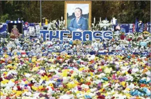  ?? AFP ?? Tributes for late Leicester owner Vichai Srivaddhan­aprabha are left at the King Power Stadium ahead of the club’s English Premier League match with Burnley on Saturday.