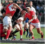  ?? GETTY IMAGES ?? All Blacks flanker Ardie Savea rips through the middle of the Tongan defence in Hamilton.