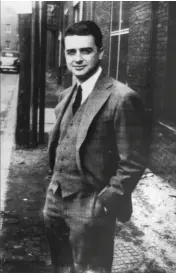  ??  ?? Edwin Land photograph­ed in 1946 outside his laboratory in Cambridge, Massachuse­tts. The original print was made using one of the experiment­al self-developing films he was working on at the time.