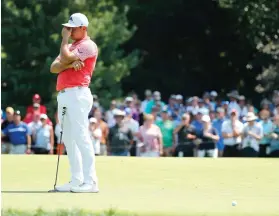  ?? AP PHOTO/JEFF ROBERSON ?? MISS. Gary Woodland reacts after missing a putt on the fifth green during the second round of the PGA Championsh­ip.