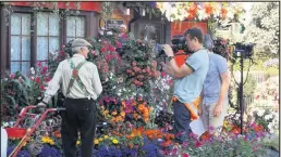  ??  ?? The famous BBC TV programme Gardeners’ World, paid a visit to the town to interview Loughborou­gh’s Mr Bloom, Harry Cook.