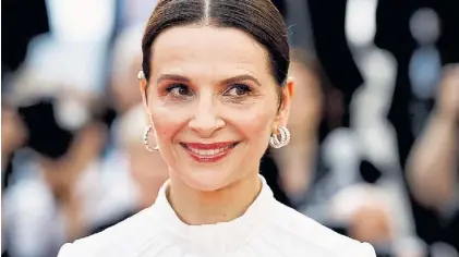  ?? REUTERS ?? Radiante. A los 59 años, Binoche luce y se luce en la película del director de “El aroma de la papaya verde”.