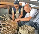  ??  ?? A traveler learning how to make a basket from a local