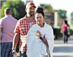  ??  ?? Concert survivors Melissah and Stephen Burke, left, of Seattle, were among the lucky ones. Sonny Melton, right with wife Heather, died attempting to drag her to safety. She was uninjured