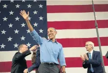  ?? SCOTT OLSON / GETTY IMAGES NORTH AMERICA ?? ON THE TRAIL: Former President Barack Obama campaigns for Wisconsin Democratic candidates, including congressio­nal candidate Dan Kohl, left, and gubernator­ial candidate Tony Evers, right, during a rally Friday in Milwaukee.