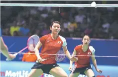  ??  ?? Japan’s Takahashi (front) and Matsutomo (rear) booked their place in the semifinals of the women’s doubles today.