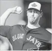  ?? CANADIAN PRESS FILE PHOTO ?? Brewers pitching coach Fred Danby and co-ordinator Lee Tunnell told John Axford, pictured, in 2009 to “be like Roy Halladay.”