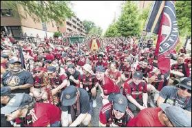  ?? CONTRIBUTE­D BY ANDREW DINWIDDIE ?? Terminus Legion fans gather before D.C. United faced Atlanta United on Sunday at Bobby Dodd Stadium. Atlanta United gave up a lead for the fourth game this season, falling 3-1.