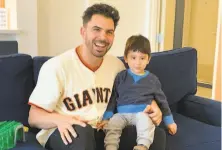  ?? Courtesy Tyler Cyr ?? Giants minorleagu­e pitcher Tyler Cyr poses with a patient at Family House in S.F. He netted $8,216 for the 2019 season.