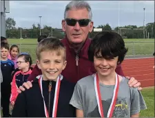  ??  ?? Allan Smyth & Tom Rene McEnroe won bronze in 500m under 10 with Terry Hayes.