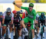  ??  ?? Champ on the Champs: Bennett wins in Paris, wearing the green jersey