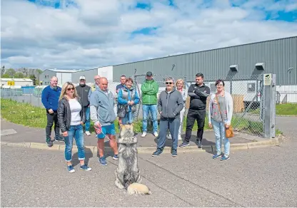  ?? Picture: Kim Cessford. ?? Some of the staff who attended a meeting about the planned closure of the Fishers plant at Inveralmon­d Industrial Estate, Perth.