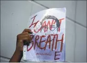  ?? Sakchai Lalit Associated Press ?? A FLIER with the activist’s last known words is seen at a protest outside Cambodia’s embassy in Thailand.