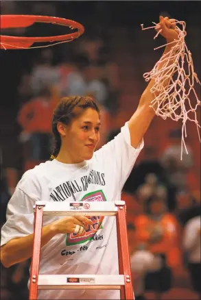  ?? File photo ?? UConn’s Rebecca Lobo cuts down the nets in celebratio­n of a 70-64 win over Tennessee for the Huskies first national championsh­ip, 25 years ago today.