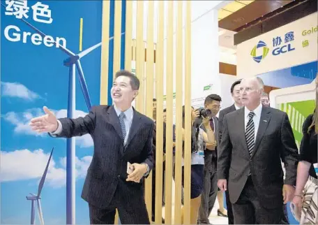  ?? Ng Han Guan Associated Press ?? GOV. JERRY BROWN attends a clean energy event in Beijing on Wednesday. Chinese climate change experts on Thursday offered some of their most definitive rebuffs to President Trump’s actions, pointedly turning to Brown — and California — as a substitute...