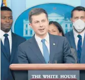  ?? SUSAN WALSH/AP ?? Transporta­tion Secretary Pete Buttigieg speaks Monday at a White House briefing on the six-month anniversar­y of the bipartisan infrastruc­ture law.