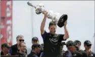  ?? GREGORY BULL — THE ASSOCIATED PRESS ?? Emirates Team New Zealand Blair Tuke celebrates after defeating Oracle Team USA to win the America’s Cup Monday in Hamilton, Bermuda.