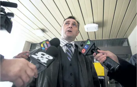  ?? THE CANADIAN PRESS ?? Scott Reid, lawyer for Justin Kuijer, speaks outside of the Robert S. K. Welch Courthouse in St. Catharines, Thursday, following Kuijer’s court appearance. Kuijer faces a charge of first-degree murder in the death of Nathan Dumas, as well as attempted...