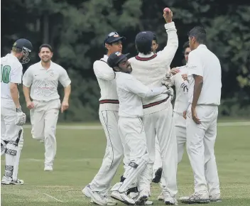  ??  ?? Bharat Sports celebrate after Castor opening batsman Cameron Dockerill is caught at slip.