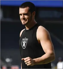  ?? KELVIN KUO — THE ASSOCIATED PRESS ?? Derek Carr is slated to be the Raiders’ starting quarterbac­k for the upcoming season but will have competitio­n from Marcus Mariota.