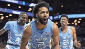  ?? BRAD PENNER/USA TODAY SPORTS ?? Joel Berry II (2), Brandon Robinson (4) and Sterling Manley (21) will try to help North Carolina successful­ly defend its NCAA title.