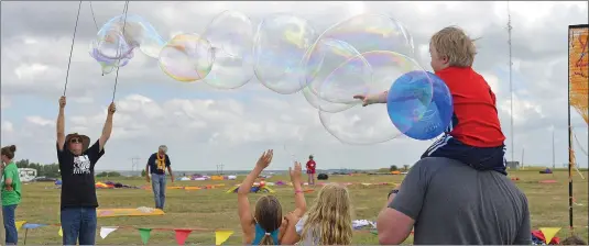  ?? SOUTHWEST BOOSTER PHOTO ?? Even though the winds did not fully cooperate at the 14th annual Saskpower Windscape Kite Festival, there were still a variety of fun activities to keep kids of all ages entertaine­d during the two day event on June 23 and 24.