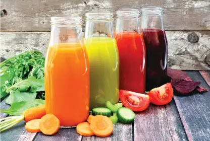  ?? DREAMSTIME/TNS ?? Juicing can be a fun and tasty way to ramp up fruit and vegetable intake.