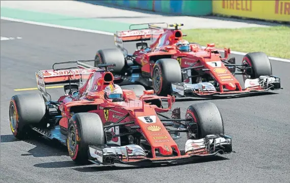  ?? FOTO: AP ?? Ferrari dio un paso al frente en Hungría copando la primera fila al dominar la clasificac­ión con Vettel y Raikkonen. Los de Maranello no lograban un doblete en clasificac­ión desde Mónaco