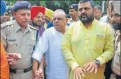  ?? GURPREET SINGH/HT ?? District Congress chief Gurpreet Gogi (in white kurta) in RPF custody in Ludhiana on Wednesday.