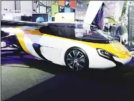  ??  ?? This file photograph shows Slovakian company AeroMobil’s flying car on display at Le Bourget, during the Internatio­nal Paris Air Show. Aeronautic­s giants are treating the idea of a flying car with caution as such a project raised more questions than it...