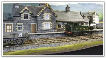  ??  ?? GWR 14XX No. 1467, a Tower Brass model, that I brush painted, stands in front of Llanidris station, which is based on Llanbrynma­ir. I drew the artwork for the bargeboard­s with Adobe Illustrato­r and sent them off to be laser cut.