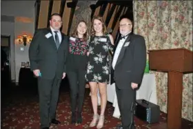  ?? SUBMITTED ?? The Chardon Annual Chamber named two winners of its $1,000 college scholarshi­ps at its Annual Meeting— Cameron Peters, second from left, and Madeline Caldro, both of Chardon. Cameron is a senior at Chardon High School while Caldro attends James A....