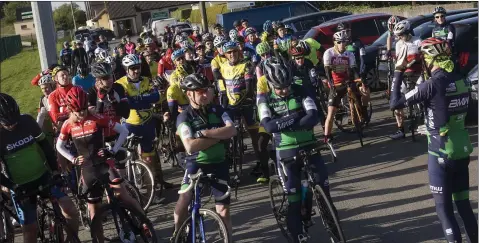  ?? PHOTOS BY JOE BYRNE ?? The cyclists gather for the start of the Tour of the Falling Leaves in Baltinglas­s.