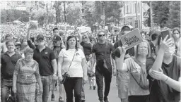  ?? AP ?? Thousands of people attend a protest in support of Russian regional Gov. Sergei Furgal and against President Vladimir Putin on Saturday.