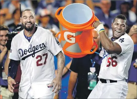  ?? Wally Skalij Los Angeles Times ?? OUTFIELDER­S MATT KEMP, left, and Yasiel Puig were hoping to make a bigger splash for the Dodgers in 2018. The two, along with pitcher Alex Wood and catcher Kyle Farmer, are on their way to Cincinnati after the club shed about $14 million in payroll.