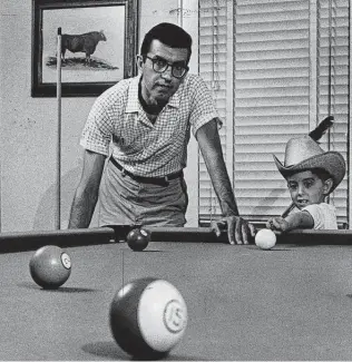  ?? Staff file photo ?? The author delves into famed novelist Larry McMurtry, shown circa 1968 with his son James.