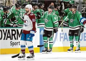  ?? Tony Gutierrez/Associated Press ?? Miro Heiskanen, center, scored a pair of goals as the Stars beat the Avalanche 5-3 on Thursday in Dallas to even their best-of-seven series at a game apiece.