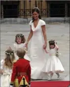  ?? ANDREW TESTA, NYT ?? Middleton, left, served as bridesmaid at the April 2011 wedding of her sister to Prince William, at Westminste­r Abbey in London.