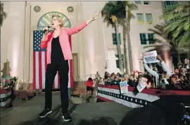  ?? K.C. Alfred San Diego Union-Tribune ?? ELIZABETH WARREN raised $24.6 million from over half a million donors last quarter. Bernie Sanders pulled in $25.3 million and Joe Biden just $15.2 million.