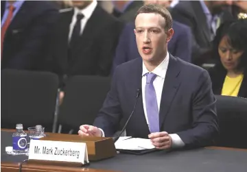  ??  ?? Facebook CEO Zuckerberg testifies before a Senate Judiciary and Commerce Committees joint hearing regarding the company?s use and protection of user data on Capitol Hill in Washington, US on Apr 10. — Reuters photo
