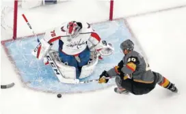  ?? THE ASSOCIATED PRESS ?? Vegas center Ryan Carpenter, right, can’t get a shot past Washington goaltender Braden Holtby during the first period in Game 2 on Wednesday in Las Vegas.