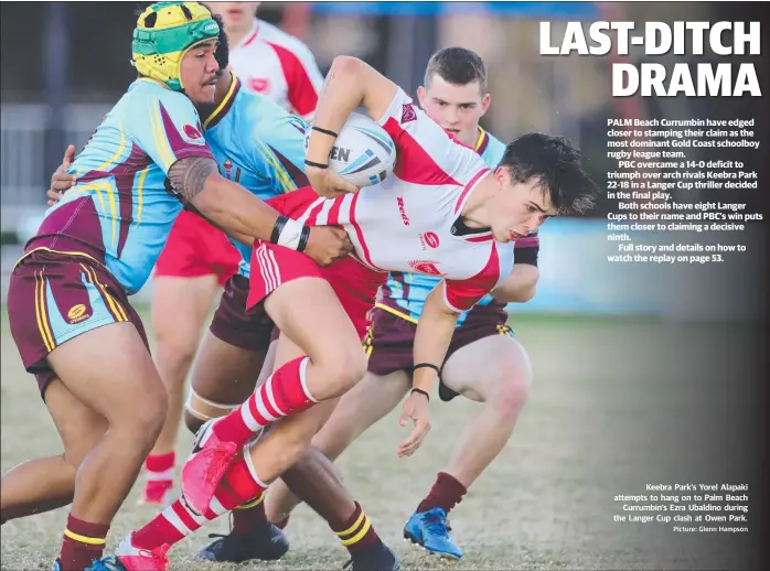  ?? Picture: Glenn Hampson ?? Keebra Park’s Yorel Alapaki attempts to hang on to Palm Beach Currumbin’s Ezra Ubaldino during the Langer Cup clash at Owen Park.