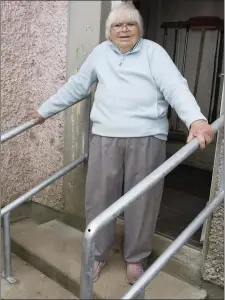  ??  ?? Barbara (Babs) Mooney with her new rails at her home in Ballyculla­ne.