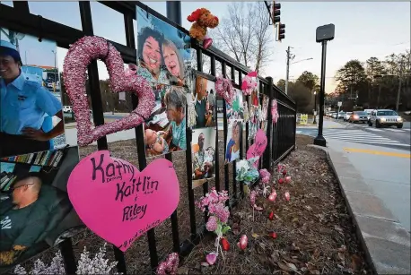  ??  ?? Above: A memorial for Kaitlin Hunt, baby Riley and Kathy Deming is seen last month on Arnold Mill Road in Woodstock where they were fatally struck in 2017. CURTIS COMPTON / CCOMPTON@AJC.COM