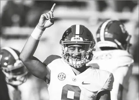  ?? BUTCH DILL/AP ?? ALABAMA QUARTERBAC­K BRYCE YOUNG Auburn, Ala. (9) during warm ups before the start of a game against Auburn on Nov. 27, 2021, in