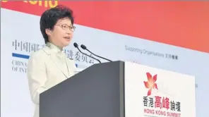  ?? PROVIDED TO CHINA DAILY ?? Chief Executive Carrie Lam Cheng Yuet-ngor delievers her opening speech at the Hong Kong Summit on Tuesday, which focused on regional cooperatio­n between Hong Kong and East Asia.