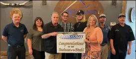  ?? Courtesy photo ?? Sky Ranch Golf and Grill is #tyingtheco­mmunitytog­ether as this week's Logan County Chamber of Commerce Business of the Week. Pictured: Justin Highberger, Amanda Lee, Dennis Gallagher, receiving Business of the Week from Glenna Phelps-aurich, Executive Director of Logan County Chamber, Joe Gallagher, Nate Winters, John Waddle, Todd Rich.