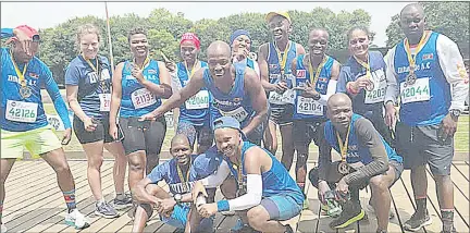  ?? ?? Zithande Athletics Club runners left a mark in Piet Retief, South Africa, for the Assegaai Marathon.