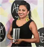  ??  ?? Proud moment: Shalini posing with her trophy at the Internatio­nal Convention Centre Sydney.