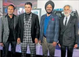  ??  ?? Designer Dhruv Vaish, wrestler Sangram Singh, RS Kalsi, executive director, marketing and sales, Maruti Suzuki India Limited and Sunil Sethi, president, Fashion Design Council of India